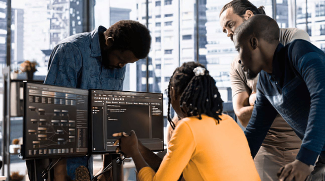 Technical team collaborating on business technology solutions
